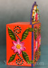 Side angle of the handmade Peruvian nativity retablo highlighting its vibrant colors and artisan craftsmanship. Side angle of the handmade Peruvian nativity retablo highlighting its vibrant colors and artisan craftsmanship.