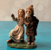 Marolin boy and girl gazing upward nativity figure made in Germany
