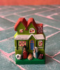 Front view of Ilobasco folk art nativity scene with colorful windows