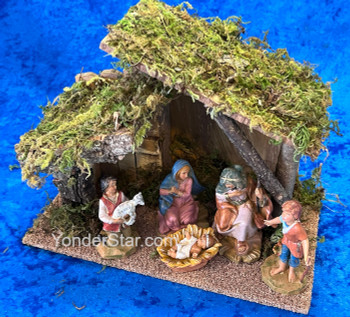 Fontanini 5 inch nativity set with Holy Family, removable Infant Jesus, shepherds Zane and Savio, and rustic wood stable made in Italy.