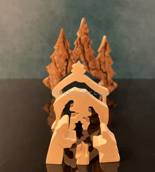 Minimalist handcrafted nativity scene with forest backdrop
