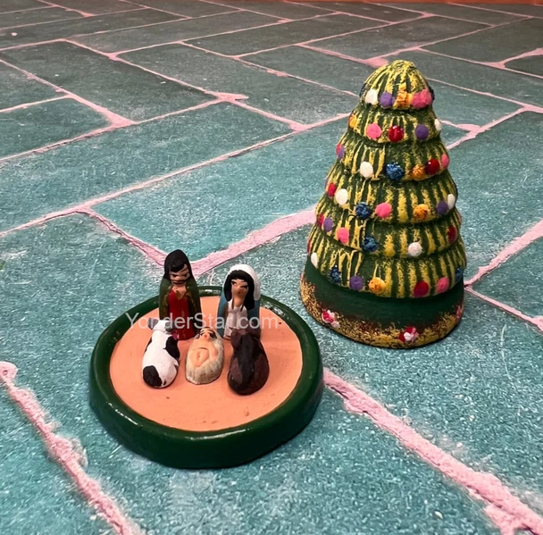 Miniature Christmas tree surprise nativity from El Salvador with ceramic Holy Family and removable decorated tree