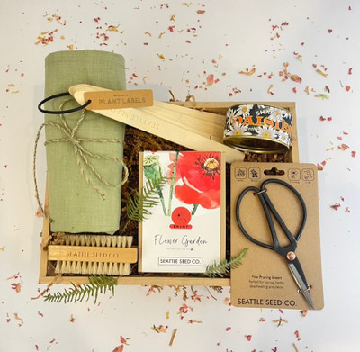 Green Thumb Gift Crate

This gift crate is great for the seasoned or newbie gardener in your life! Includes: Linen apron in color of your choice, boxed seeds consisting of 5 packets of non-GMO seeds(calendula, cosmos, poppies, marigolds, sweet peas) from Seattle Seed Company, forged steel flower snips, fingernail brush, wooden stake seed plant labels, and a cannister of Shasta Daisy seeds. 

Seattle flower delivery by Juniper Flowers

Due to changes in season, weather, and availability we reserve the right to make substitutions in flowers for your order. Our photos are a GUIDE to our designs.