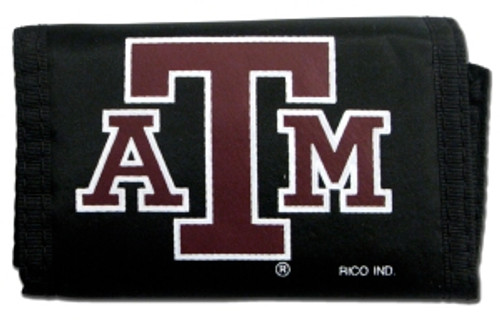 This officially licensed durable nylon wallet features vibrant team colors and logos. It has a compartment for money, 3 sewn in pockets and a plastic photo/credit card holder. The velcro closure keeps everything securely inside. Measures approximately 5"x3" in size. Made By Rico Industries. This officially licensed durable nylon wallet features vibrant team colors and logos. It has a compartment for money, 3 sewn in pockets and a plastic photo/credit card holder. The velcro closure keeps everything securely inside. Measures approximately 5"x3" in size. Made By Rico Industries.