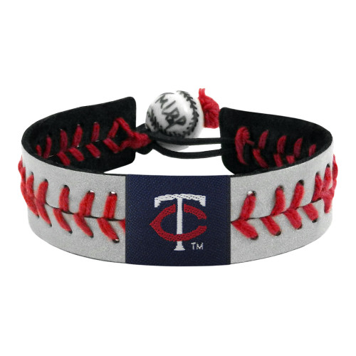 Support your team by wearing a classic team  bracelet! This handmade bracelet is made of genuine leather. The bracelet also features a ceramic bead and elastic loops for closure. There are two loops for adjustable sizing, making sure your bracelet is secure. One size fits all, and will fit most children and adults. Not recommended for children under 5. Made By Gamewear