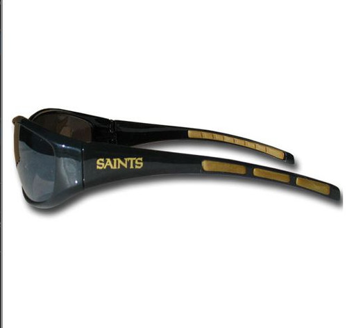 Protect your eyes while showing your team spirit with these great team sunglasses! The sunglasses are made of plastic, and features the screen printed team logo on both sides of the arms. The sunglass arms also feature rubber team colored accents. These sunglasses block UVA and UVB rays with UV 400 protection. Made By Siskiyou