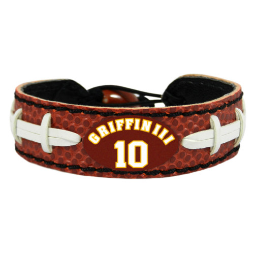 Support your team by wearing a classic team  bracelet! This handmade bracelet is made of genuine leather. The bracelet also features a ceramic bead and elastic loops for closure. There are two loops for adjustable sizing, making sure your bracelet is secure. One size fits all, and will fit most children and adults. Not recommended for children under 5. Made By Gamewear