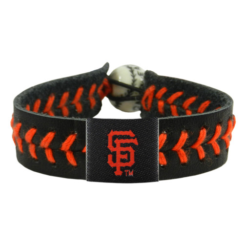 Support your team by wearing a classic team  bracelet! This handmade bracelet is made of genuine leather. The bracelet also features a ceramic bead and elastic loops for closure. There are two loops for adjustable sizing, making sure your bracelet is secure. One size fits all, and will fit most children and adults. Not recommended for children under 5. Made By Gamewear