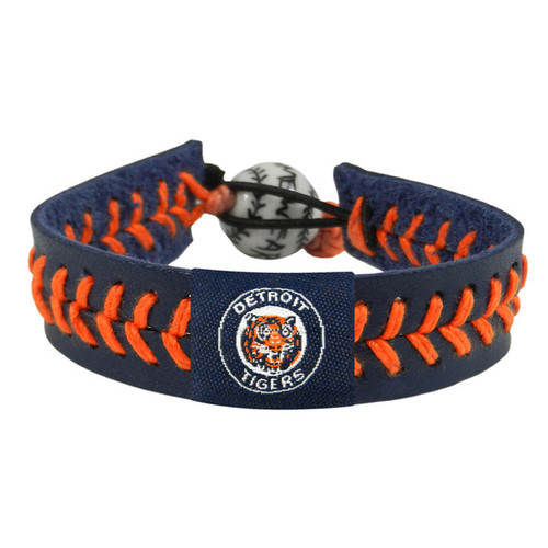 Support your team by wearing a classic team  bracelet! This handmade bracelet is made of genuine leather. The bracelet also features a ceramic bead and elastic loops for closure. There are two loops for adjustable sizing, making sure your bracelet is secure. One size fits all, and will fit most children and adults. Not recommended for children under 5. Made By Gamewear