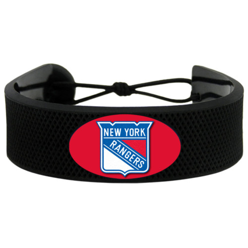 Support your team by wearing a classic team  bracelet! This handmade bracelet is made of genuine leather. The bracelet also features a ceramic bead and elastic loops for closure. There are two loops for adjustable sizing, making sure your bracelet is secure. One size fits all, and will fit most children and adults. Not recommended for children under 5. Made By Gamewear