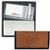 Keep track of your checking account in style with this attractive checkbook cover!  Your favorite team's logo is embroidered on the front of the cover.  This genuine leather checkbook cover has slots inside for your drivers license and 5 credit cards.  It also comes with a removable plastic 6 sleeve picture/ID holder.  Intended to be used with top tear checks.  Made by Rico.