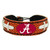 Support your team by wearing a classic team  bracelet! This handmade bracelet is made of genuine leather. The bracelet also features a ceramic bead and elastic loops for closure. There are two loops for adjustable sizing, making sure your bracelet is secure. One size fits all, and will fit most children and adults. Not recommended for children under 5. Made By Gamewear