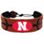 Support your team by wearing a classic team  bracelet! This handmade bracelet is made of genuine leather. The bracelet also features a ceramic bead and elastic loops for closure. There are two loops for adjustable sizing, making sure your bracelet is secure. One size fits all, and will fit most children and adults. Not recommended for children under 5. Made By Gamewear