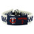 Support your team by wearing a classic team  bracelet! This handmade bracelet is made of genuine leather. The bracelet also features a ceramic bead and elastic loops for closure. There are two loops for adjustable sizing, making sure your bracelet is secure. One size fits all, and will fit most children and adults. Not recommended for children under 5. Made By Gamewear