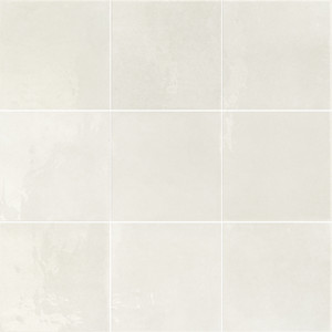 Micro Typic reimagines traditional handcrafted ceramic wall tiles in a compact 10 x 10cm format. This glazed, gloss-finish wall tile has a gently uneven surface, so light pools and shifts across every piece. White sits at the cool, bright end of the palette — a clean architectural tone that bounces light around a room and keeps small spaces feeling open, airy and easy to style around. A gloss wall tile for kitchens, bathrooms, hospitality spaces and feature walls, Micro Typic White can be laid in a grid or brick-set pattern to play up its handmade character.