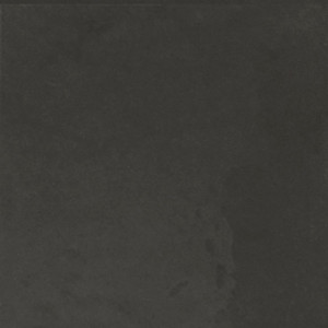 Typic reimagines traditional handcrafted ceramic wall tiles in a compact 100x100mm format. This glazed, gloss-finish wall tile has a gently uneven surface, so light pools and shifts across every piece. Black delivers the strongest contrast in the range, its glossy surface catching light in a way that adds drama and weight to a feature wall or splashback. A gloss wall tile for kitchens, bathrooms, hospitality spaces and feature walls, Typic Black can be laid in a grid or brick-set pattern to play up its handmade character.