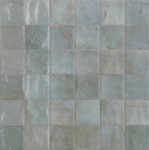 Melange Glicine brings the same rich, layered character of the Melange range into a soft, contemporary grey. Tile-to-tile variation in texture, pattern and colour means each piece behaves a little differently under light, giving walls a sense of depth that a flat, single-tone grey simply can't match. The 100x100mm format holds a regular overall shape, while irregular edges introduce a subtle, handcrafted texture that suits more tactile, artisan-inspired interiors. A glossy glaze finishes the surface, reflecting light and adding a soft sheen that keeps the grey feeling fresh rather than cold. It's a good option for anyone searching for grey bathroom tiles or kitchen tiles with more nuance than a standard flat grey, and at Tile Space we find it works especially well in New Zealand homes wanting a distinctive, atmospheric feel in smaller, personal spaces like ensuites and splashbacks.