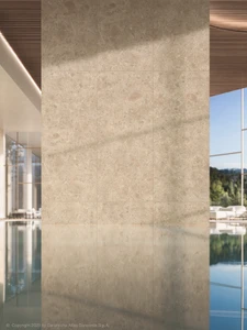 Nyra Ambrosia carries a warm beige tone with rich, fossil-like texture, bringing natural depth and variation to the 600x1200mm matt porcelain format throughout each tile. Shaped by a biophilic design philosophy, Ambrosia imagines a stone that does not exist in nature, layering texture and tone for an authentic, tactile surface finish. Ambrosia suits living areas, hallways and feature walls where a warm, earthy backdrop is wanted, pairing well with organic modern and Mediterranean-inspired interior schemes.
