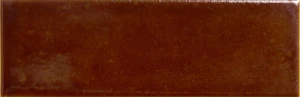 Amarcord Mogano draws on the deep reddish-brown of polished mahogany timber, a striking, saturated tone that reads almost burgundy in low light. Its glossy surface catches highlights unevenly, giving each tile a sense of movement and craft that flat colour simply can't achieve. Mogano makes a bold feature wall or bar backdrop, and pairs especially well with brass fittings and warm timber joinery.