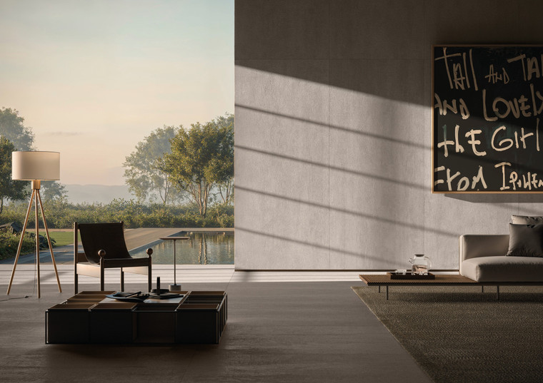 Inspired by Brutalist architecture, Sintese Platina expresses the raw beauty of concrete in a cool platinum-grey palette, with rust-toned flecks echoing natural oxidation of steel. The XL 1200x2700mm slab format minimises joints almost entirely, delivering a seamless, monolithic finish across large walls, benchtops and open-plan floor areas. Suited to feature walls, kitchens and contemporary living spaces, the matt surface lets the slab's soft texture and depth read cleanly across its full expanse.