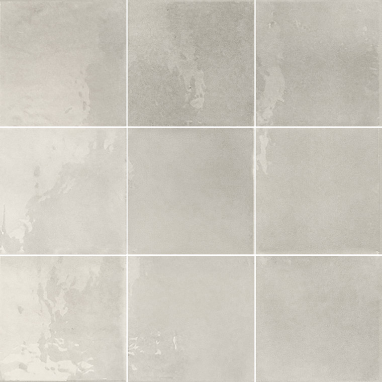 Typic reimagines traditional handcrafted ceramic wall tiles in a compact 100x100mmm format. This glazed, gloss-finish wall tile has a gently uneven surface, so light pools and shifts across every piece. Dust brings a muted, chalky neutral to the range, somewhere between grey and beige, giving walls a soft, powdery backdrop that suits pared-back, contemporary interiors. A gloss wall tile for kitchens, bathrooms, hospitality spaces and feature walls, Typic Dust can be laid in a grid or brick-set pattern to play up its handmade character.