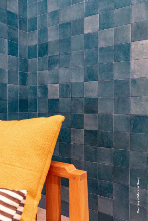 Melange Acquamarina brings a fresh, blue-toned colourway into the Melange range, evoking the shifting shades of the sea. Significant variation in texture, pattern and colour across each tile creates a surface with real depth and movement, as tones shift from piece to piece rather than repeating flatly across the wall. The 100x100mm format holds a broadly regular shape, while irregular edges introduce a soft, tactile texture well suited to more artisan-inspired interiors. A glossy glaze finishes the surface, reflecting light and enhancing the clarity and vibrancy of the blue tones for a fresh, graphic result. It's a striking option for anyone after blue feature wall tiles or bathroom tiles with genuine chromatic intensity, and at Tile Space we recommend it for New Zealand homes wanting a distinctive, coastal-inspired atmosphere in smaller, personal spaces.