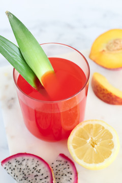 New Summer Sangria -  Our  Chardonnay is the base for a mix of dragon fruit, peach, pineapple, orange, and lemon juices that tastes like the Caribbean in a cup!