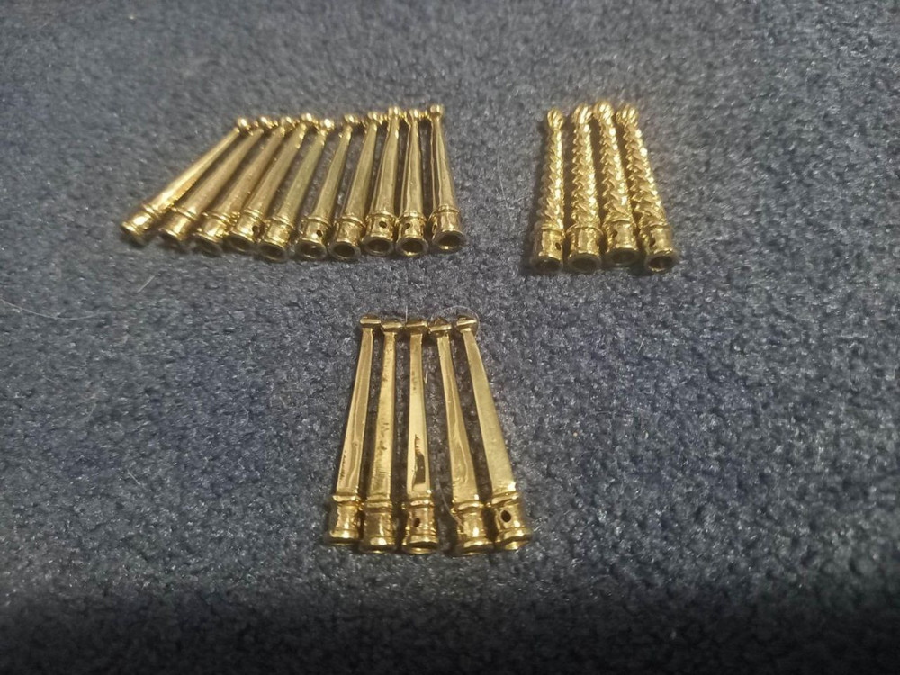 Hand-braided cord with brass tip