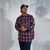 Man in plaid shirt and baseball cap wearing Perserverance Mens Flannel with supreme fabric