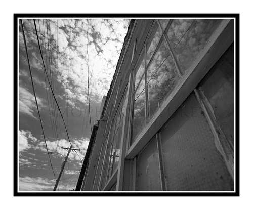 Window with Distressed Panels & Wires in Hot Springs, South Dakota 2050 B&W