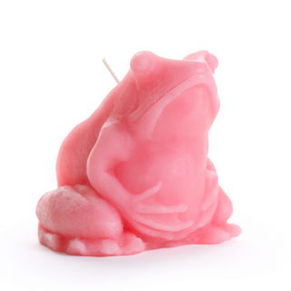 Handcrafted cherry blossom pink frog-shaped beeswax candle with visible wick, displayed on a white background — artisan spring décor by Big Dipper Wax Works.