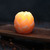 Pure Beeswax Sphere Candle, Lotus – lit lotus sphere in a dark room
