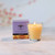 Beeswax Aromatherapy Beehive Glass Candle, Harmony (Pure Lavender) – lit beehive glass candle by a window with its gift box
