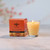 Beeswax Aromatherapy Beehive Glass Candle, Rejuvenation – lit beehive glass candle by a window with its gift box