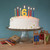 Beeswax Birthday Number Candle, 7 – lit number candles spelling 16 on a white birthday cake