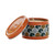 Illuminate Candle Tin Collection, Patchouli & Nutmeg (Orange) – painted Illuminate candle tin with lid off