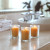 Votive Candle Sampler – lit votives in clear votive glasses
