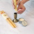 Taper Tacky Candle Positioning Wax – pressing Taper Tacky onto a taper base