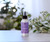 Aromatherapy Mist 4 oz, Harmony (Lavender & Lavandin) – on a sunny table with greenery and books