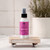 Aromatherapy Mist 4 oz, Rapture (Patchouli & Cassia) – on a wooden tray with fresh flowers