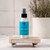 Aromatherapy Mist 4 oz, Balance (Lavender & Peppermint) – on a wooden tray with fresh flowers