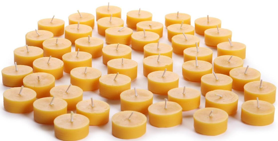 A collection of beeswax tea light candles