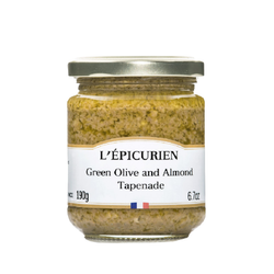 Olive and almond tapenade in glass jar.