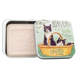Illustrated La Savonnerie de Nyons “Chats Noirs et Blancs” French soap in a reusable metal tin featuring black and white cats, 3.5 oz cotton flower–scented soap enriched with shea butter and Nyons olive oil.