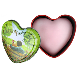 Rose scented French soap presented in a decorative reusable metal tin, inspired by traditional French floral perfumery and suitable for gifting or travel.