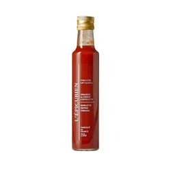 L’Épicurien Espelette Pepper Vinegar, a French condiment made with tomato purée, red bell pepper, and Espelette pepper.