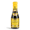 This image shows a bottle of Giuseppe Giusti Aceto Balsamico di Modena with a vibrant yellow cap, which provides a striking contrast to the dark color of the vinegar inside. Adorning the neck of the bottle is the familiar Giusti family crest: a white cross on a red shield, symbolizing the brand's storied heritage.

The main label, set against a yellow background, features black text and gold decorative accents, contributing to the premium and traditional look of the product. It clearly reads "Gran Deposito Aceto Balsamico di Modena Giuseppe Giusti," signifying it as part of Giusti's revered Gran Deposito collection of balsamic vinegar. The label's design likely includes additional details on the quality and origin of the vinegar, in line with Giusti's reputation for producing high-quality balsamic vinegars.