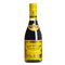 This image features a bottle of Giuseppe Giusti Gran Deposito Aceto Balsamico di Modena. The bottle has a striking yellow label with black and gold detailing. Prominently displayed is the Giusti family crest, a white cross on a red shield, which signifies the heritage and quality of the brand.

The label also includes the text "Gran Deposito Aceto Balsamico di Modena Giuseppe Giusti," which highlights the product as a traditional balsamic vinegar from Modena and indicates it is part of the Giusti family's Gran Deposito collection. The design elements of the label are intricate and elegant, suggesting that this is a high-quality product. The overall look of the bottle with its distinctive label coloring suggests a rich, aged vinegar that is likely to be used in fine cuisine.