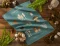 Cotton-linen tea towel featuring detailed botanical mushroom illustrations in earthy natural tones with a woodland-inspired design.