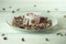 Sal de Ibiza in pink ceramic jar with rose.